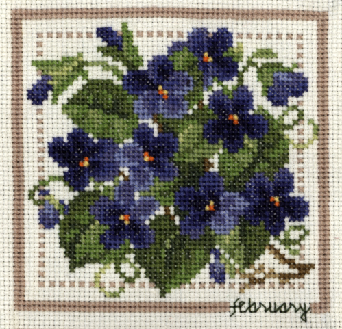 cross stitched violets